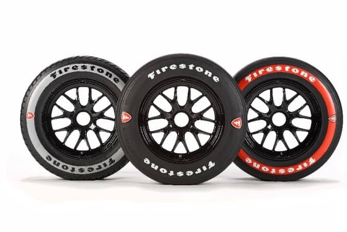 Side view of three different Firestone race tires.